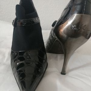 Donald J Pliner Signed Metal Pump Heel
